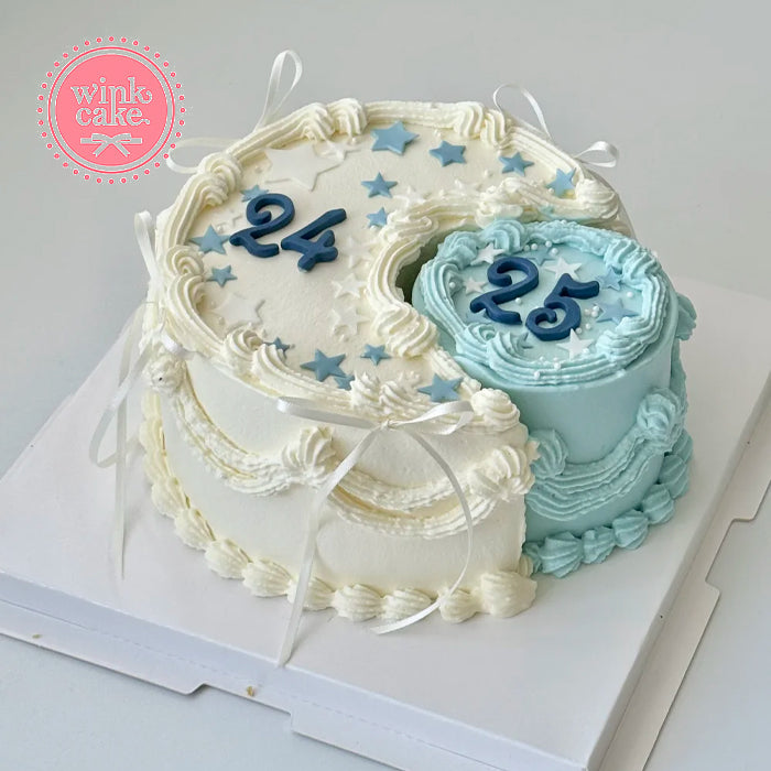 Sun, Moon, and Stars cookies in a white and blue color scheme.