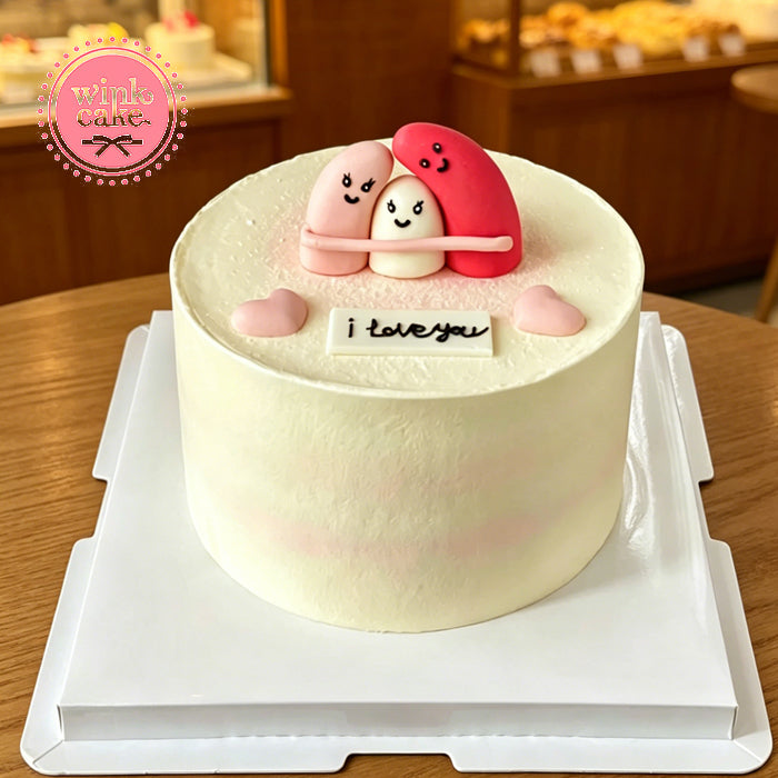 Birthday cake decorated with cute cartoon finger characters.
