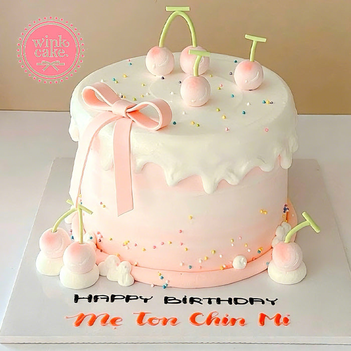 Cherry-decorated birthday cake