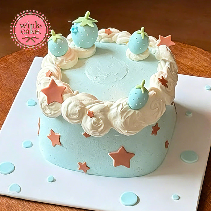 The cake is decorated with blue stars.