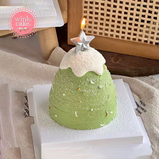 Bánh Giáng sinh hình cây thông Noel phủ tuyết trắng và xanh lá cây