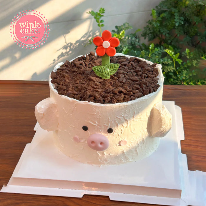 Bánh kem hoa đỏ hình chú heo con