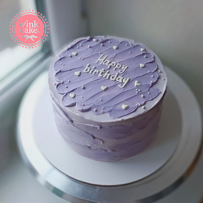 Hand-painted purple birthday cake