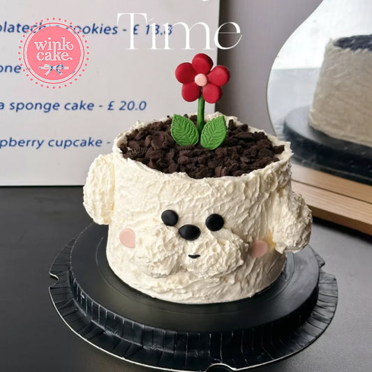 Bánh kem hoa đỏ hình chú cún con trồng trong chậu