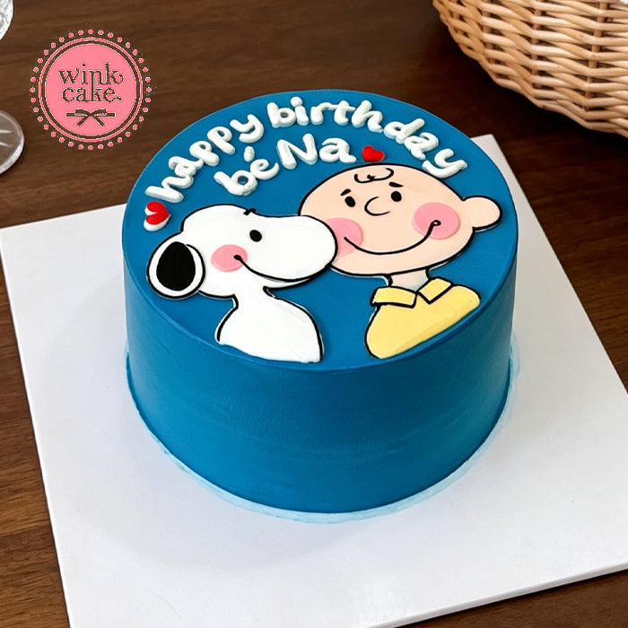 Hand-painted birthday cake featuring a cartoon puppy.