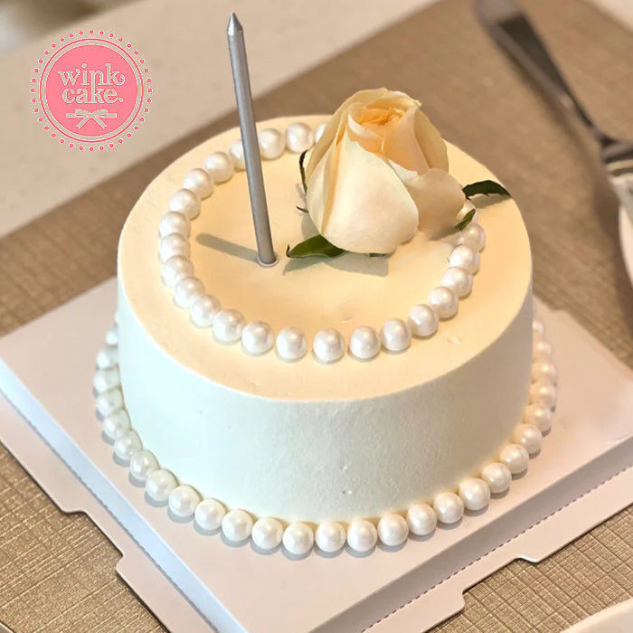 birthday cake with white flowers. Free shipping on pre-orders at winkcake.