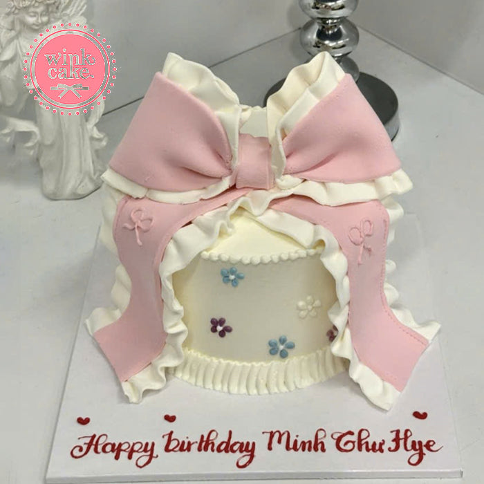 Butterfly-shaped novelty cake suitable for a girl
